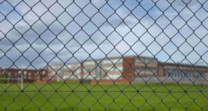 Wide commercial chain link fences.