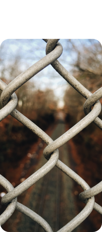 Transparent chain link fence.